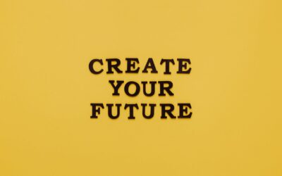 Texte en gras « CRÉEZ VOTRE AVENIR » sur fond jaune minimaliste. Design inspirant.